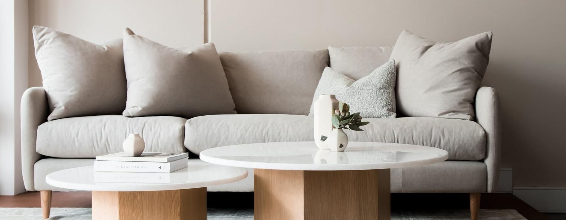 a white couch with a coffee table